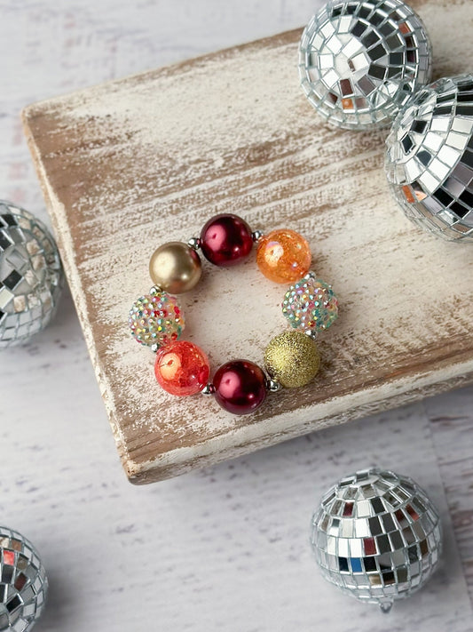 Chunky bead bracelet in fall colors with rhinestones