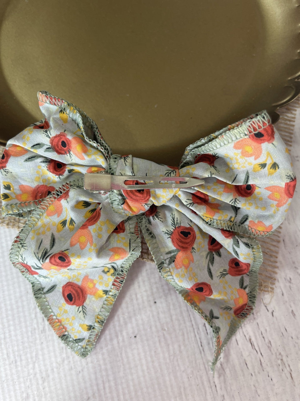 Floral print hand tied hair bow