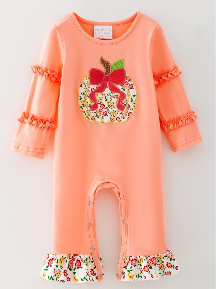 baby girl fall one-piece with pumpkin appliqué, ruffle sleeves, and floral hems