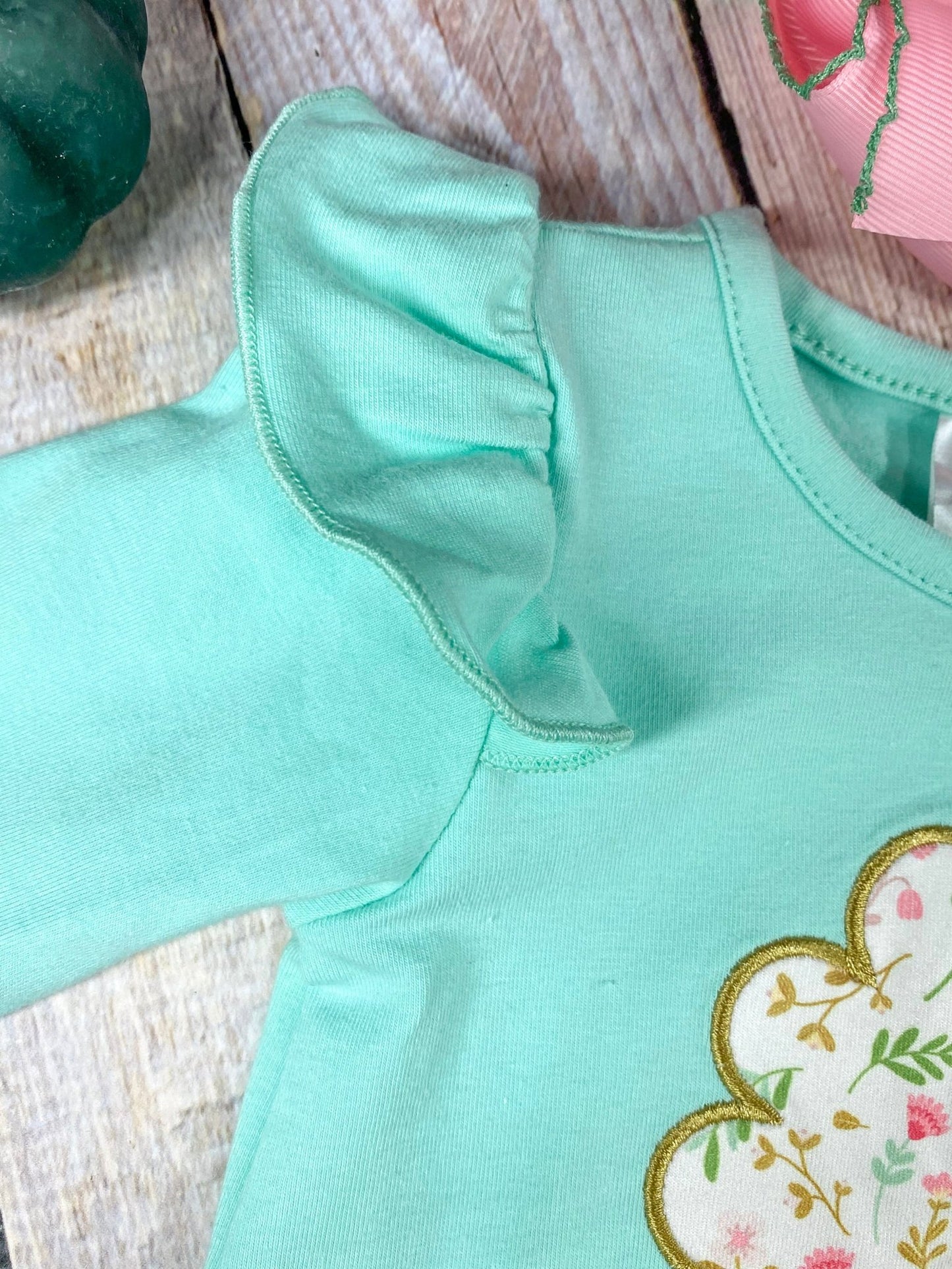 close up of ruffles on shoulder