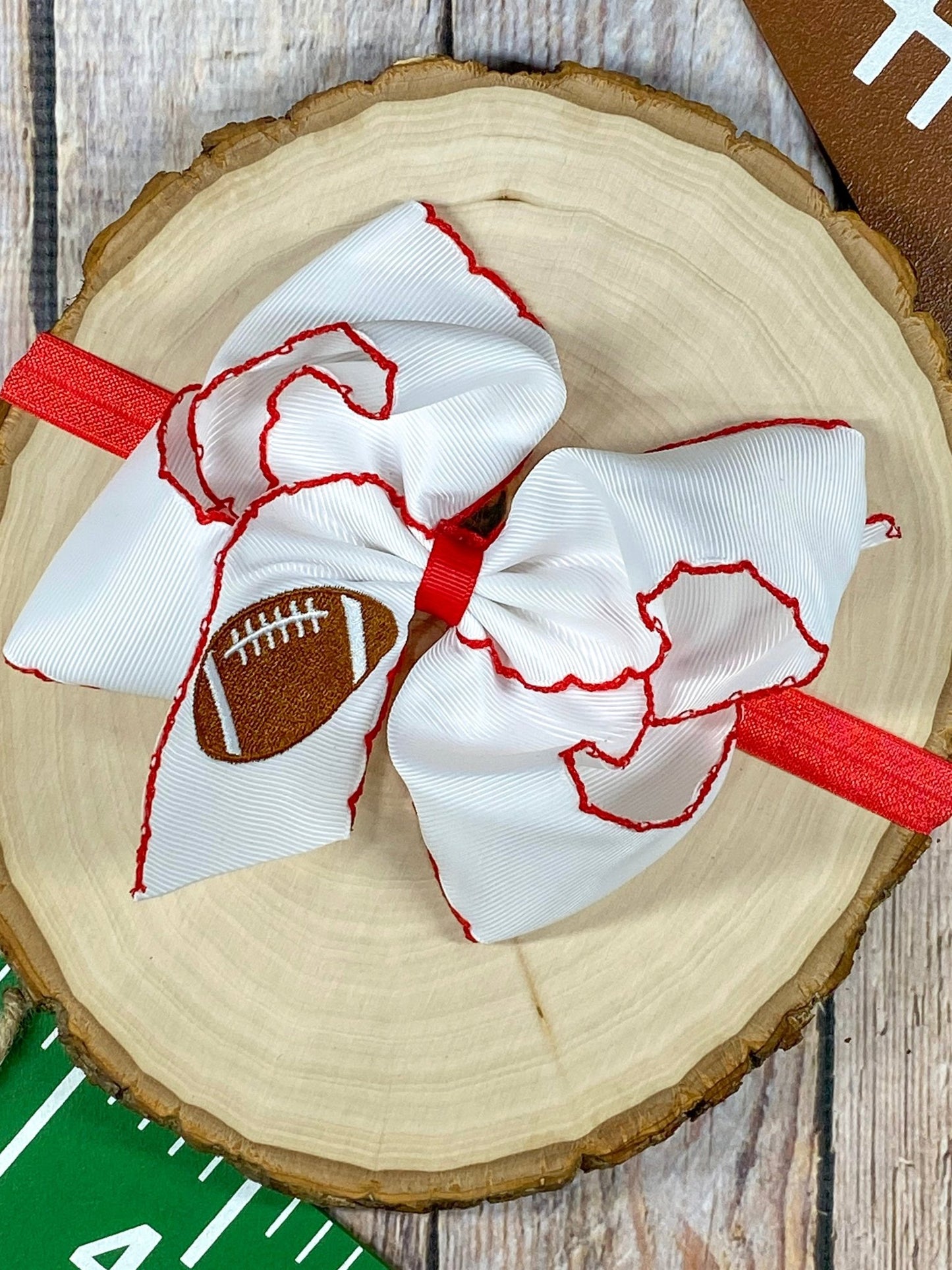 Football Embroidered Moonstitch Bow Headband with red stitching