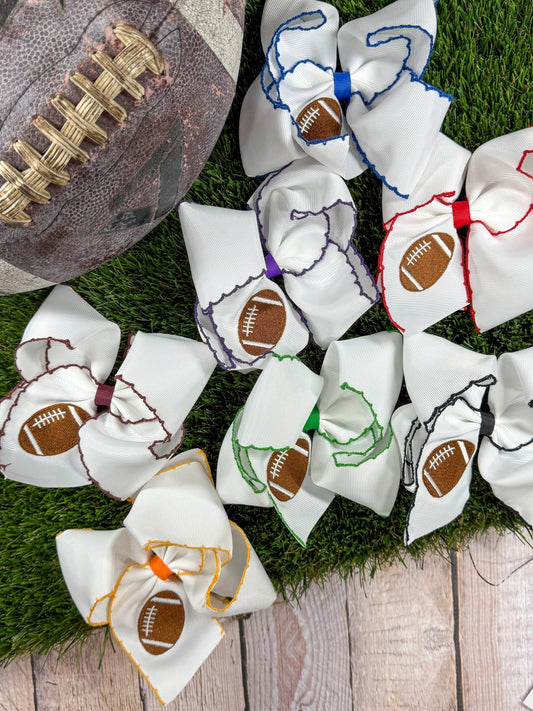 Football embroidered moonstitch hair bows in assorted team colors