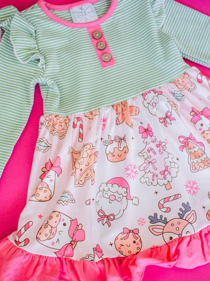 Girls dress with green top and pink gingerbread print skirt