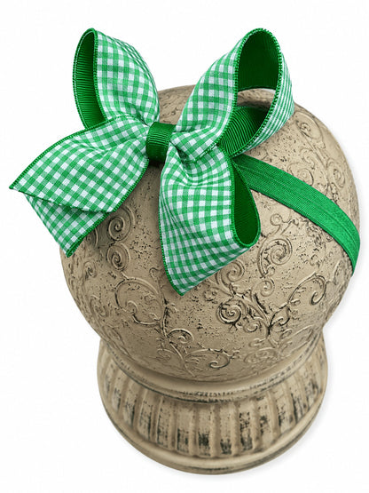 Green gingham hair bow on headband