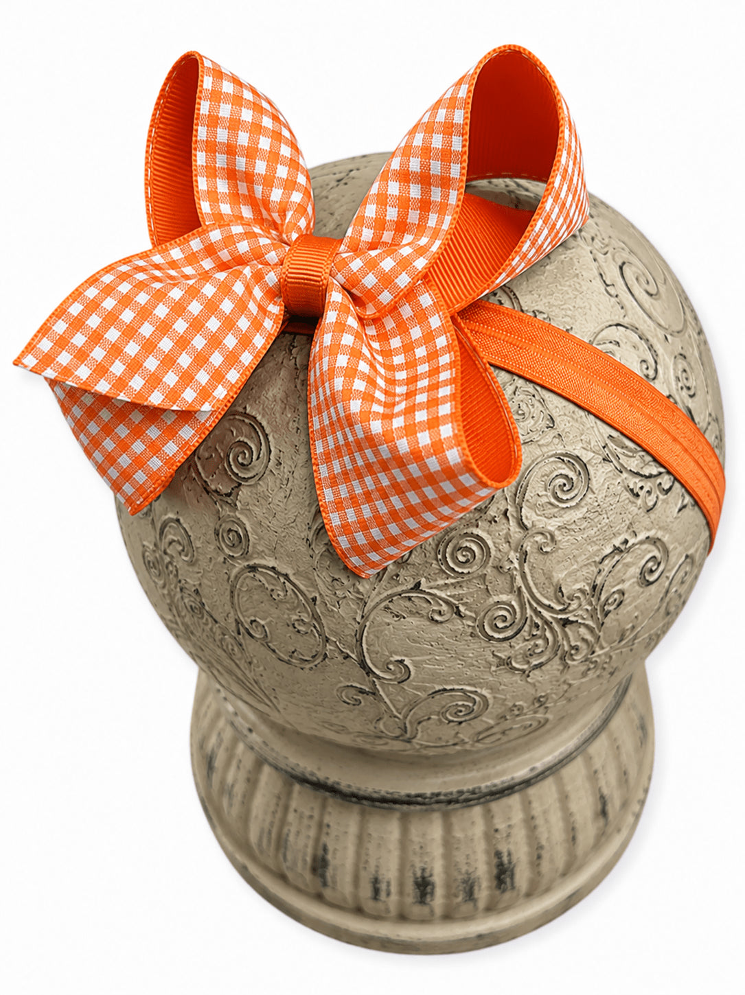 Orange gingham hair bow on headband