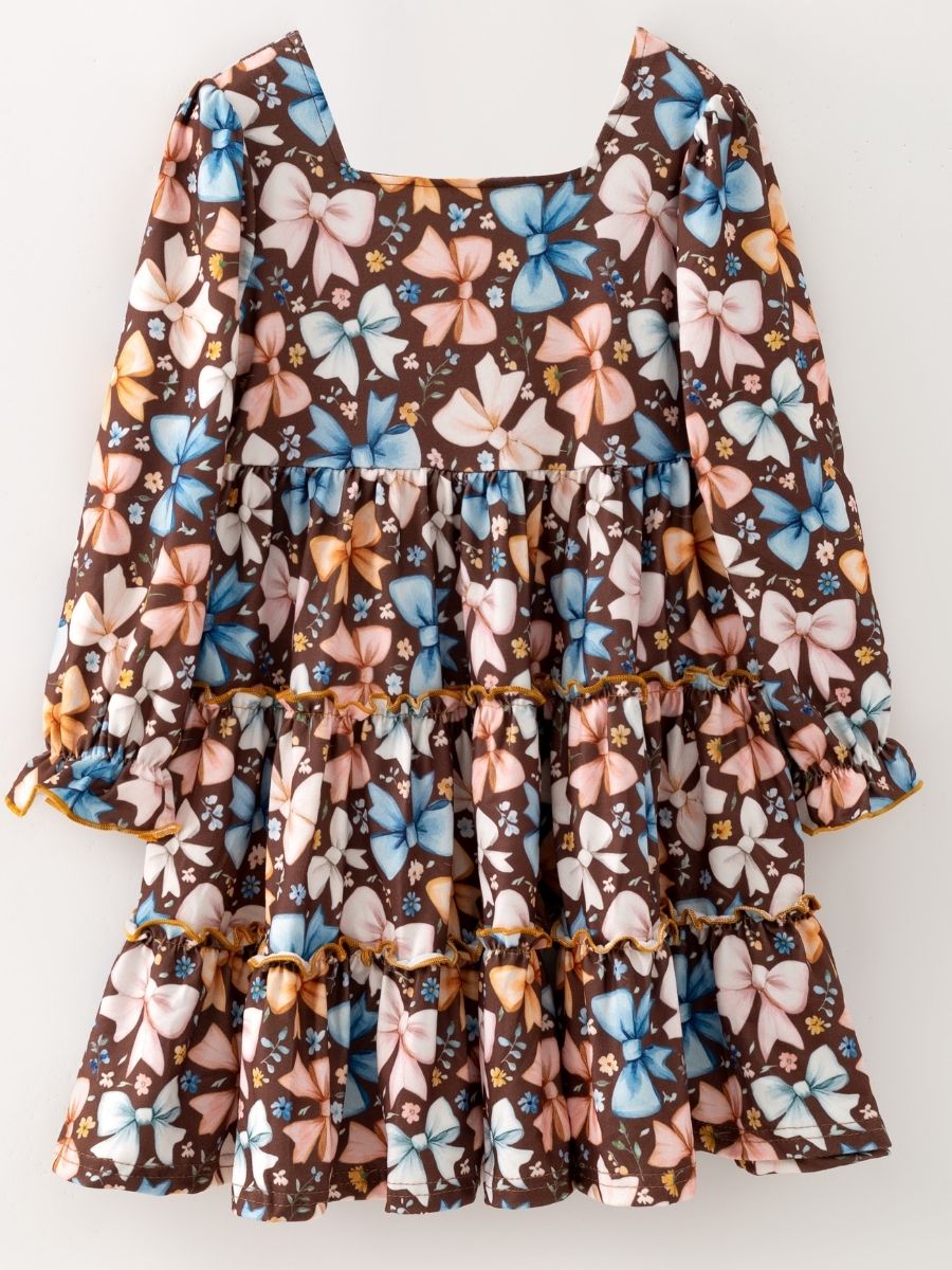 Girls brown bow print tiered dress with long sleeves and ruffle details