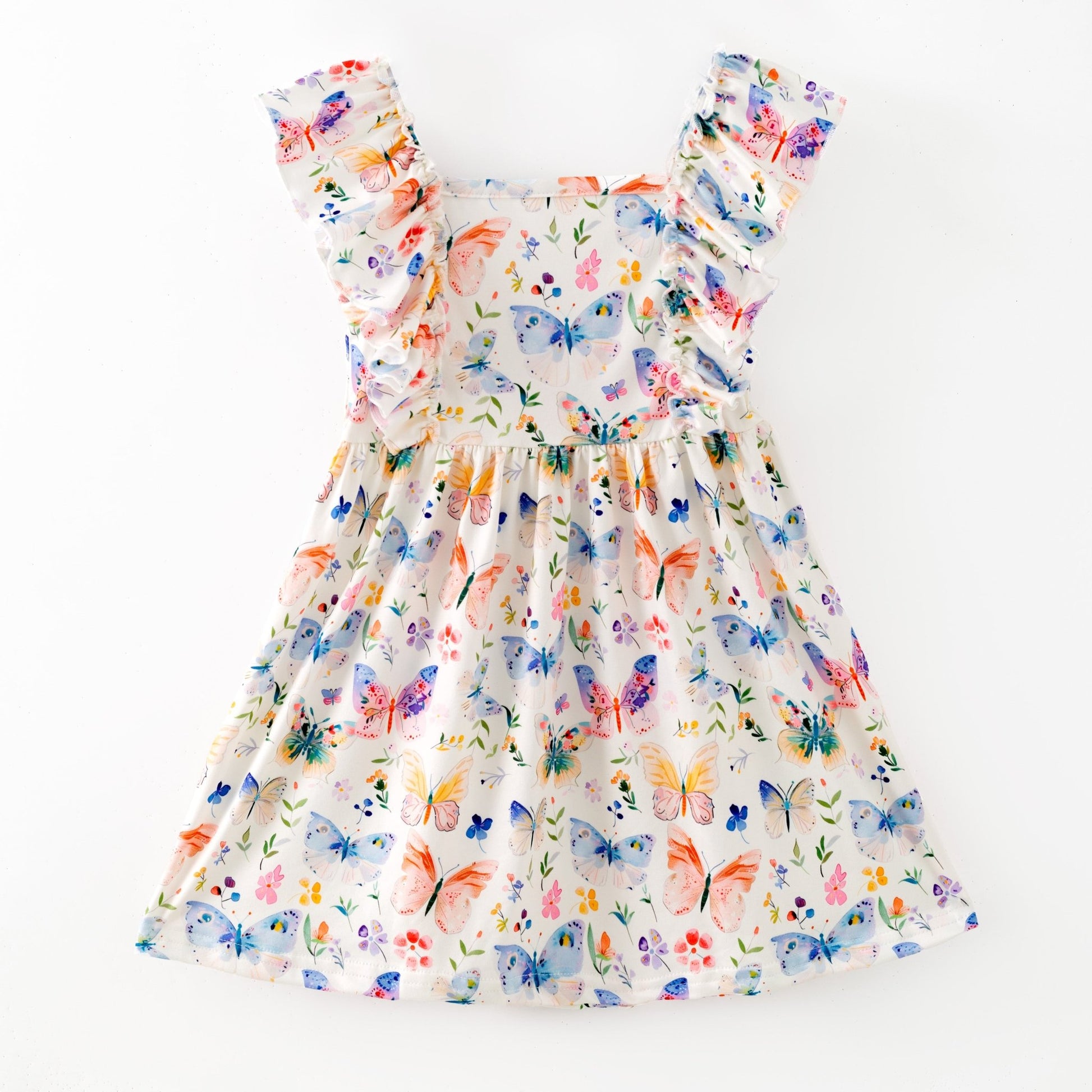 Colorful butterfly-patterned dress on a white background