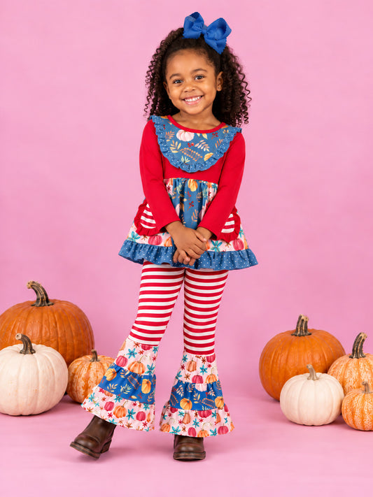 model photo of Rust ruffle pumpkin top with striped bell bottoms