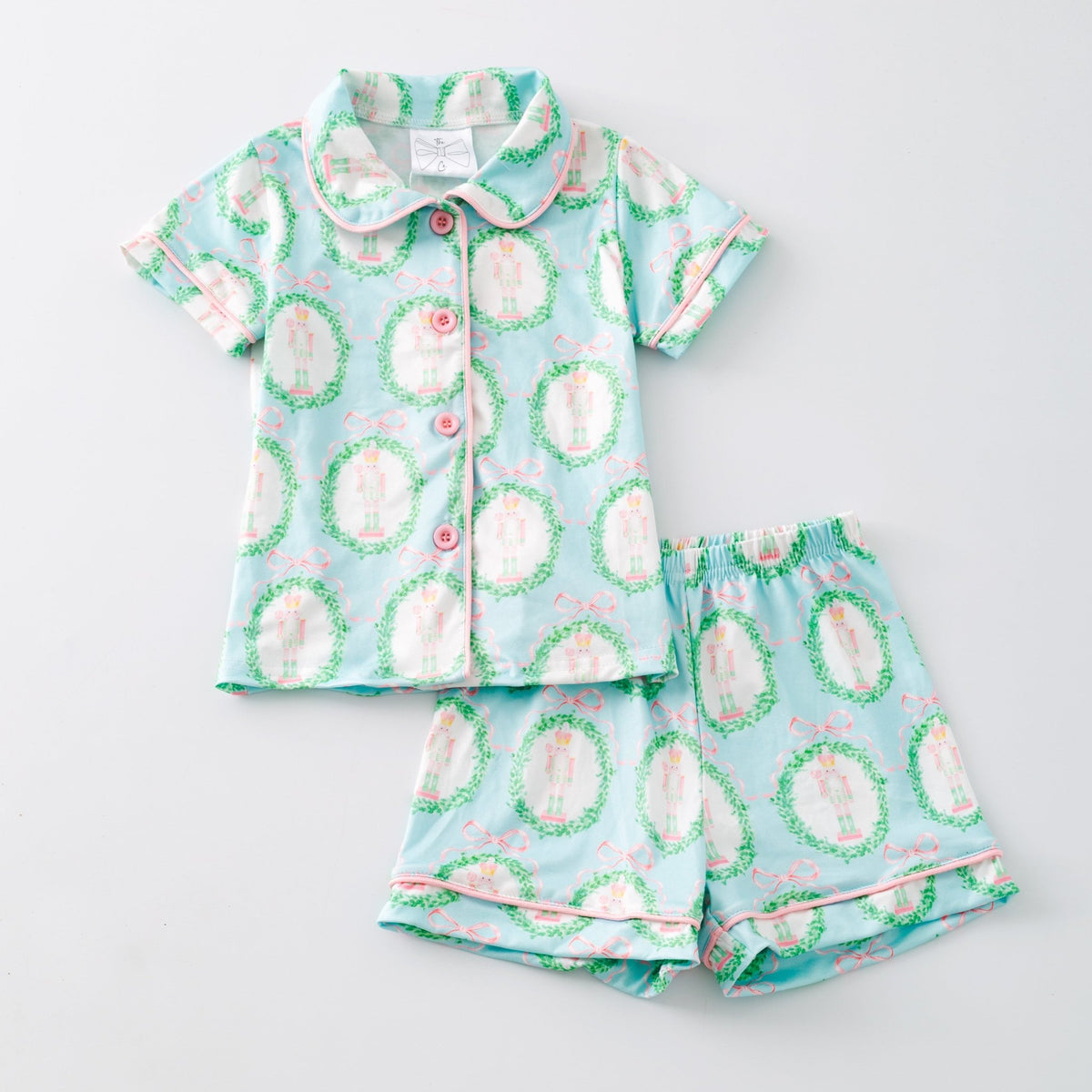 Girls nutcracker print Christmas pajama shorts set laid flat