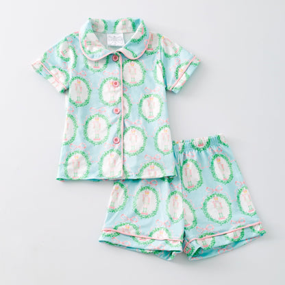 Girls nutcracker print Christmas pajama shorts set laid flat