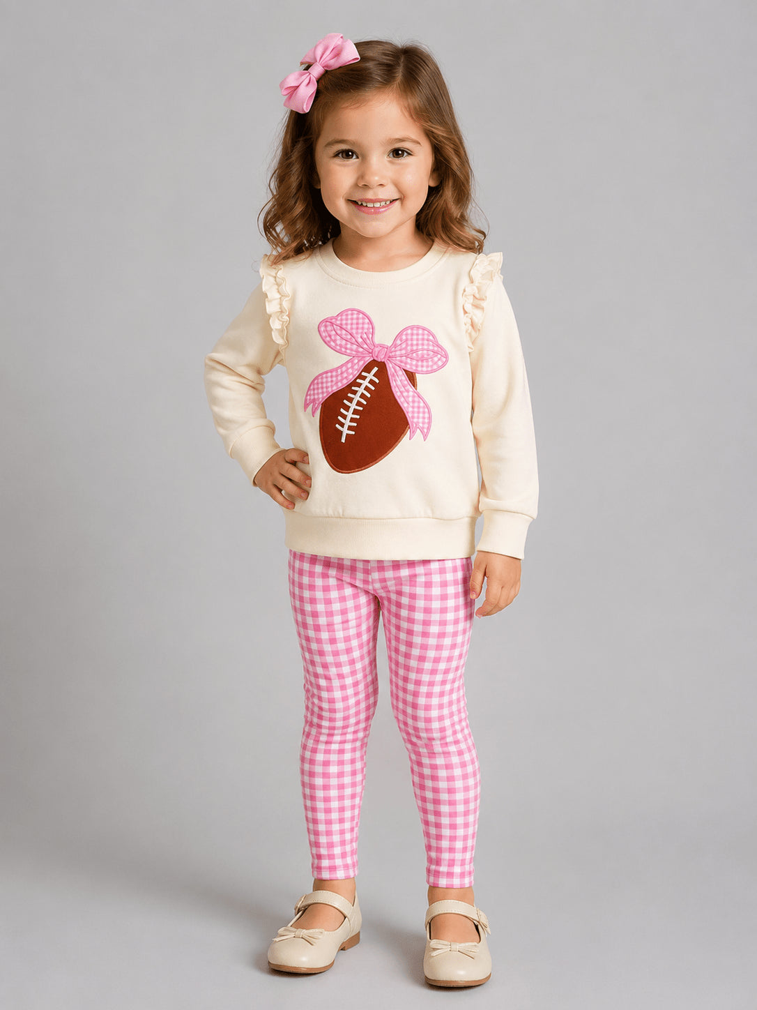 Cream football bow sweatshirt with pink gingham leggings