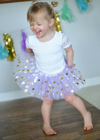 Baby-size lavender tutu with gold dots