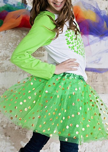 teen model wearing green gold dot tutu 