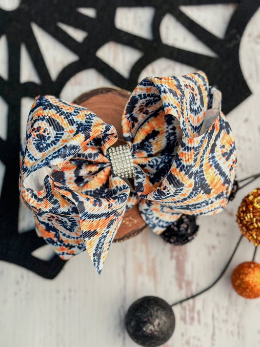 Halloween orange and black tie-dye XL hair bow with rhinestone center