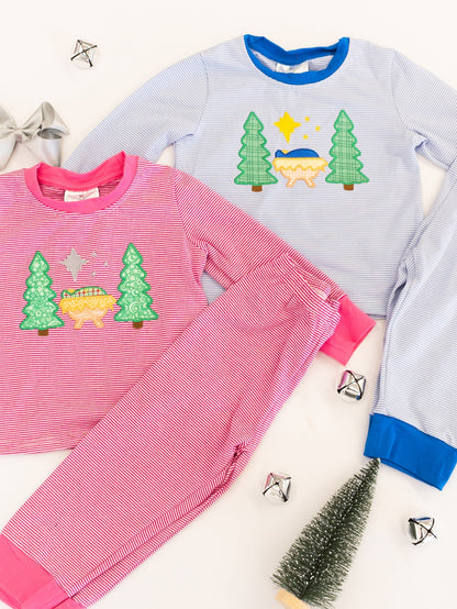 Silent Night Girls Pink PJ's next to matching boy's blue pj set