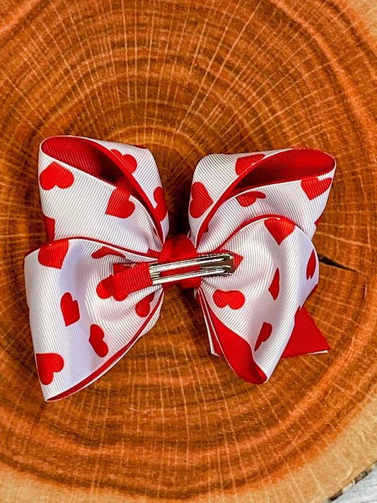Clip of heart print hair bow from The Hair Bow Company - Alternative view