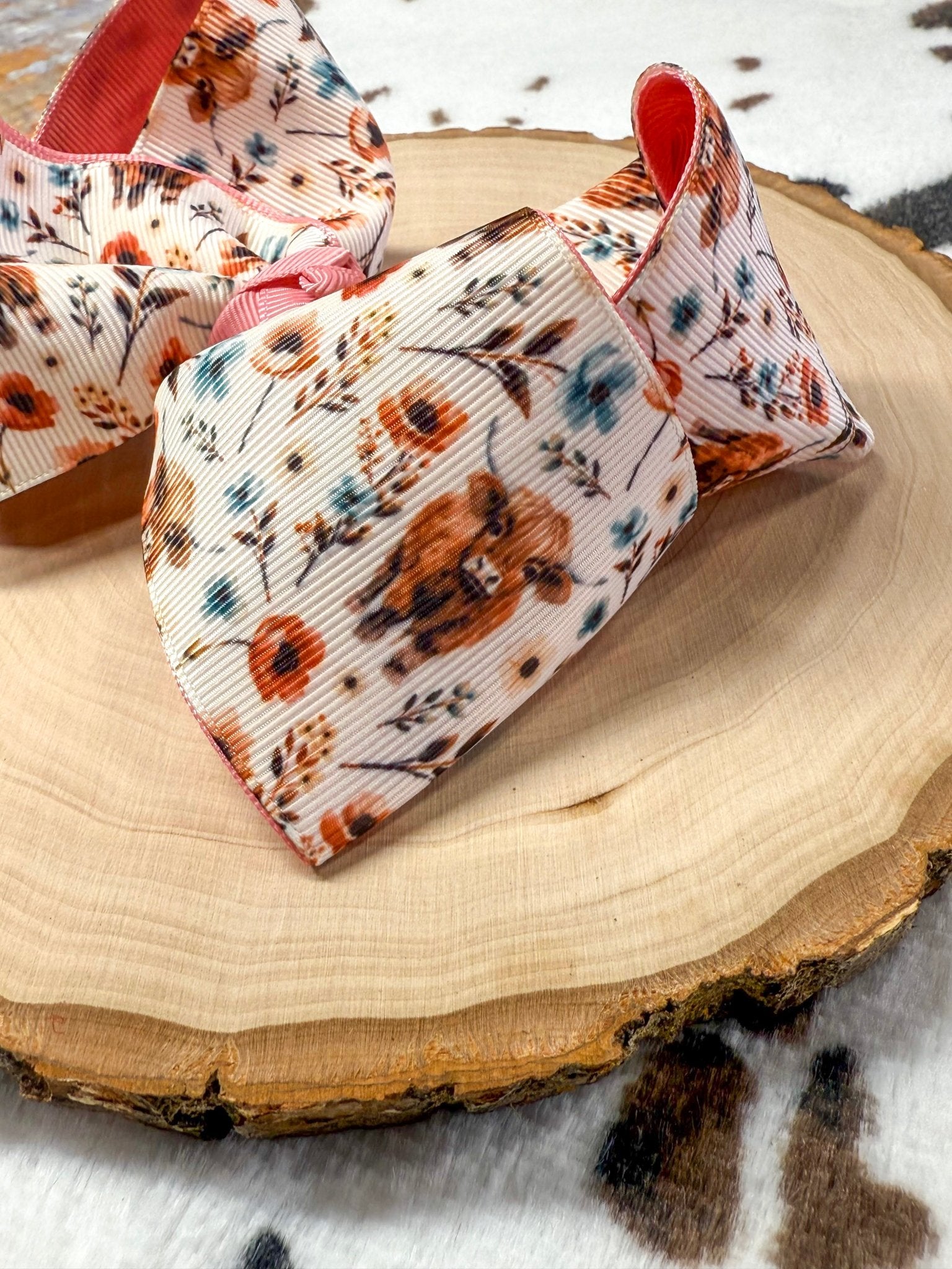 close up of the highland cow and floral pattern