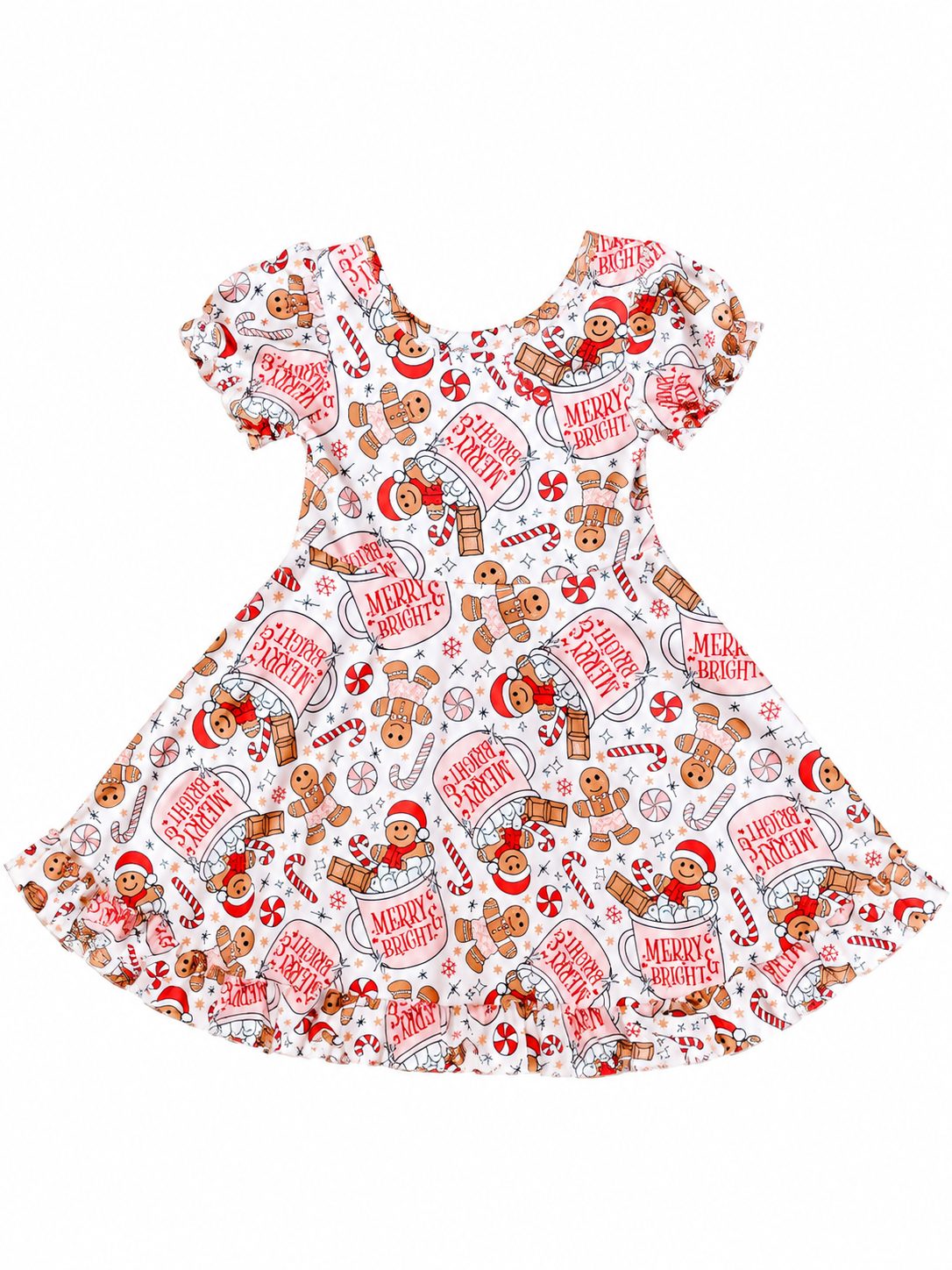 Gingerbread print girls Christmas dress on a wooden surface