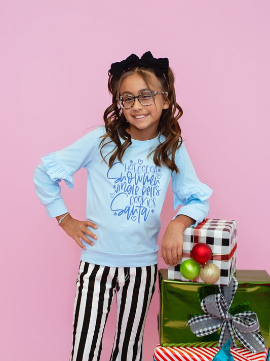 Girls blue ruffle Christmas top with snowmen and hot cocoa print