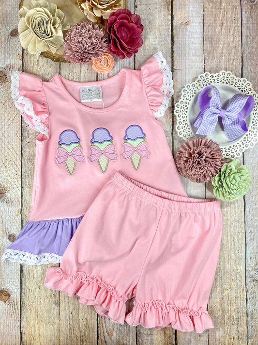 ice cream girls outfit on wooden background