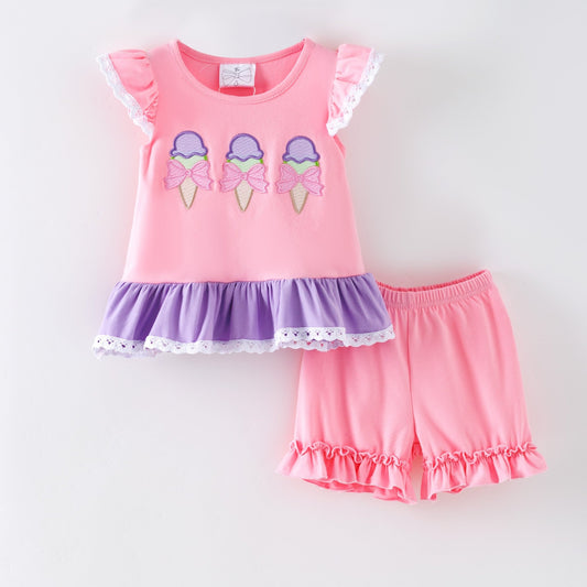 Children's pink and purple outfit with ice cream cone design on a white background