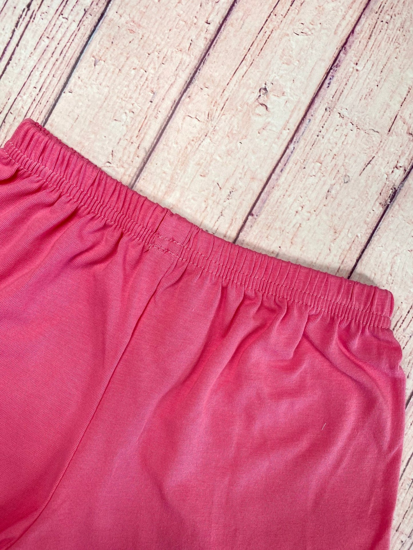 Close up detail photo of waist band on shorts