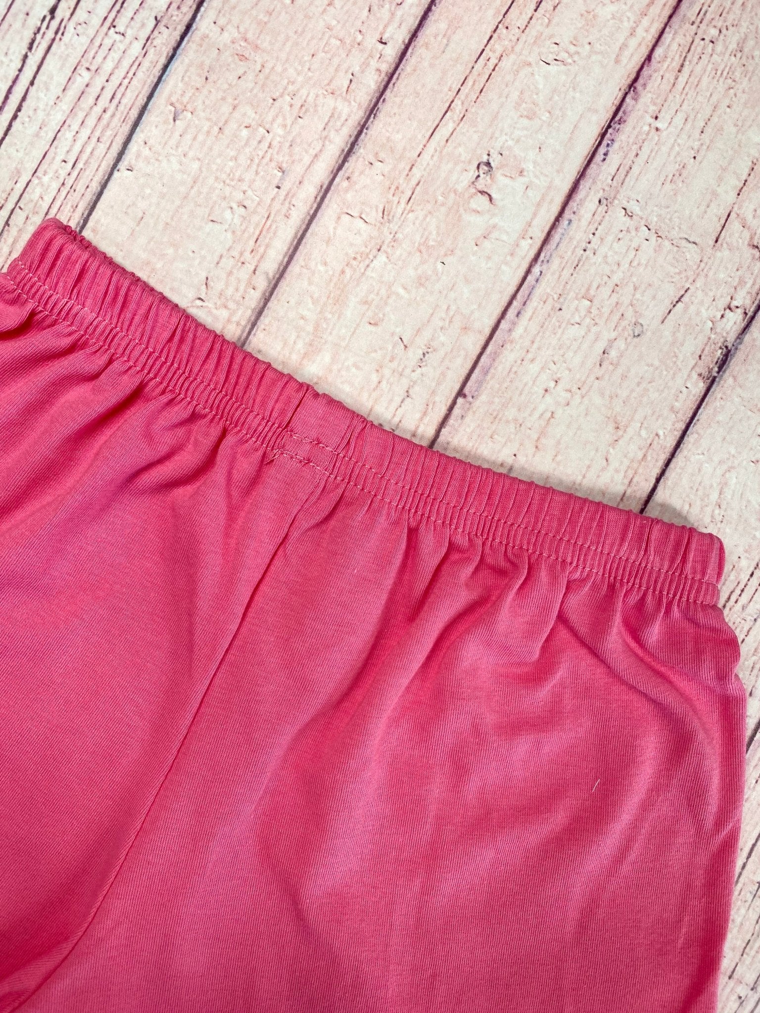 Close up detail photo of waist band on shorts