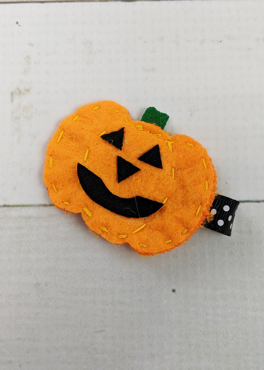 Felt jack-o-lantern pumpkin clippie with stitched edges and green stem