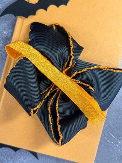 back of the headband showing the elastic satin band