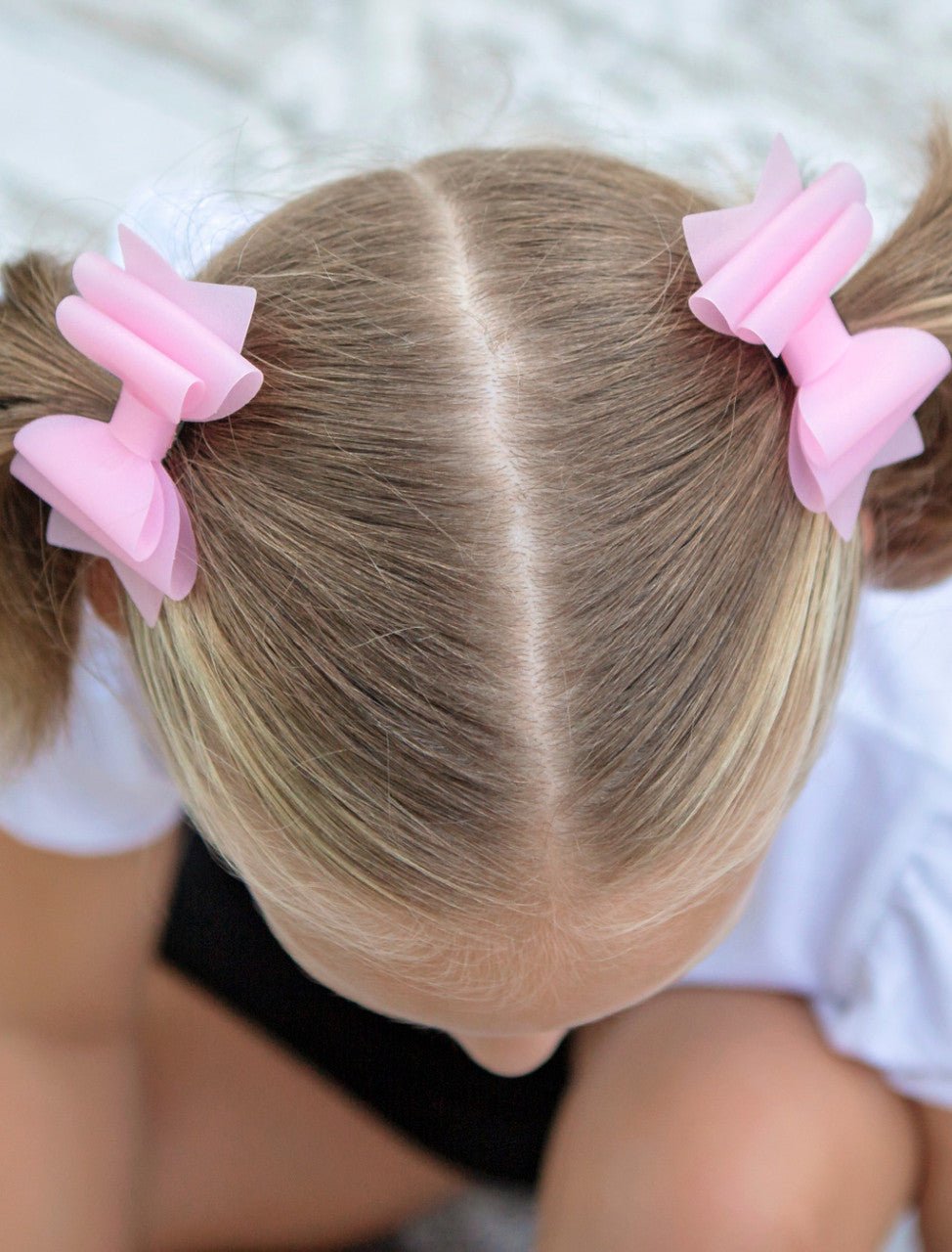 Girl wearing a jelly hair bow