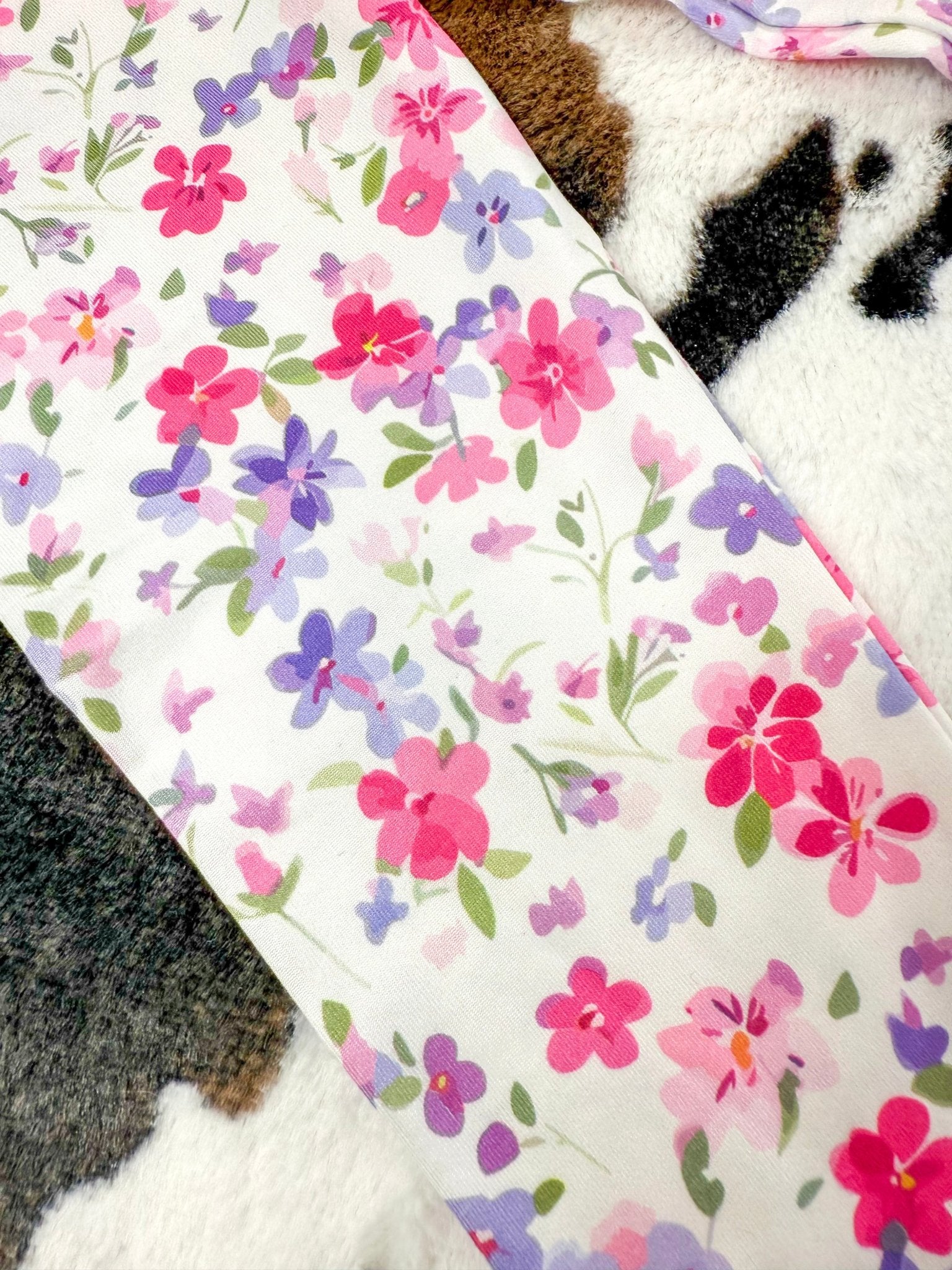 close up of floral pattern on leggings