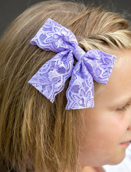 Lavendar lace Hair Bow on a model