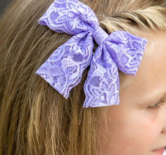 Lavendar lace Hair Bow on a model