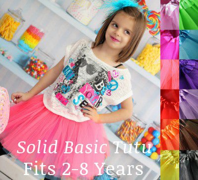Neon pink tutu layered over turquoise tutu