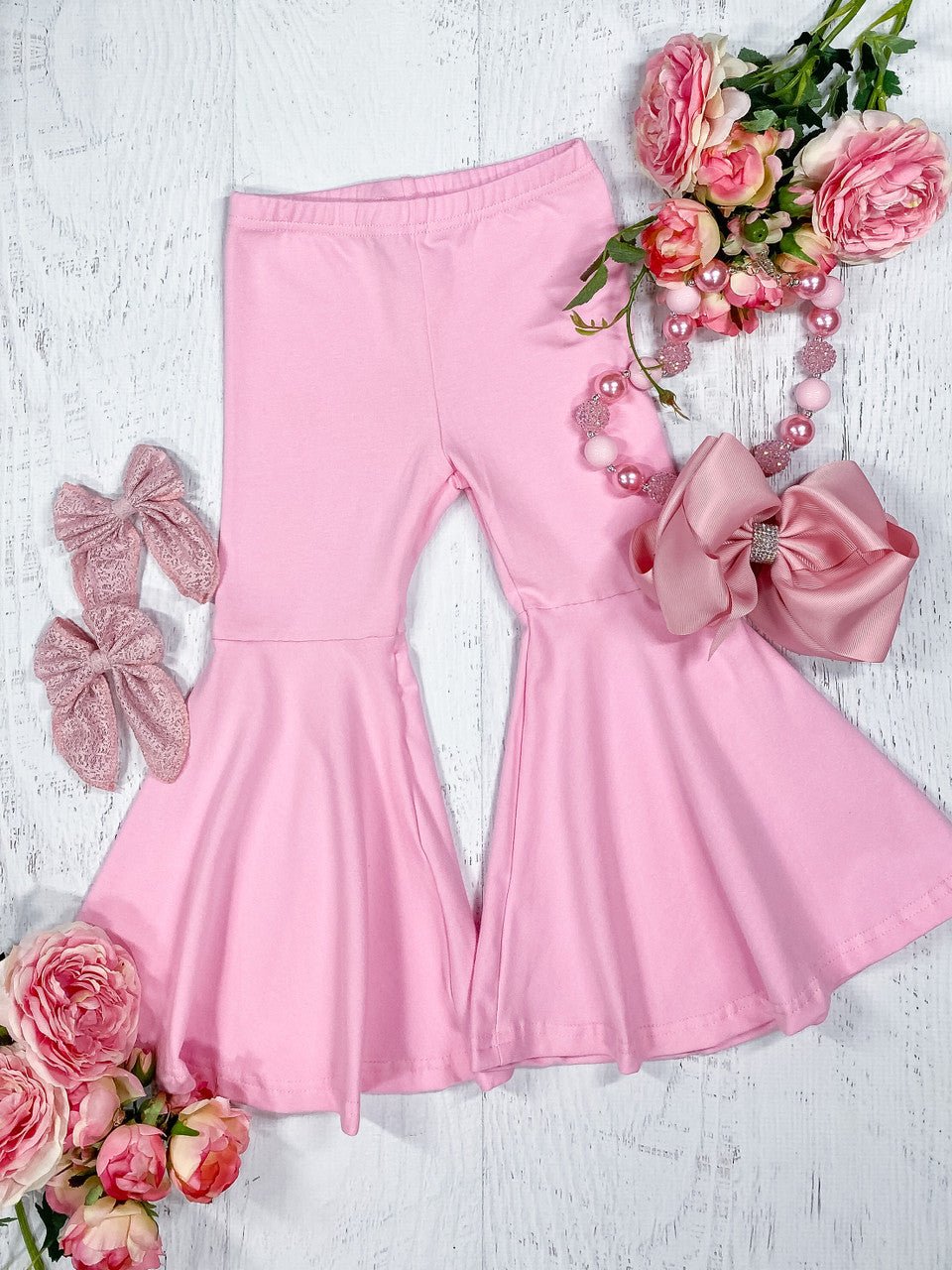 Light pink bell bottom pants for girls