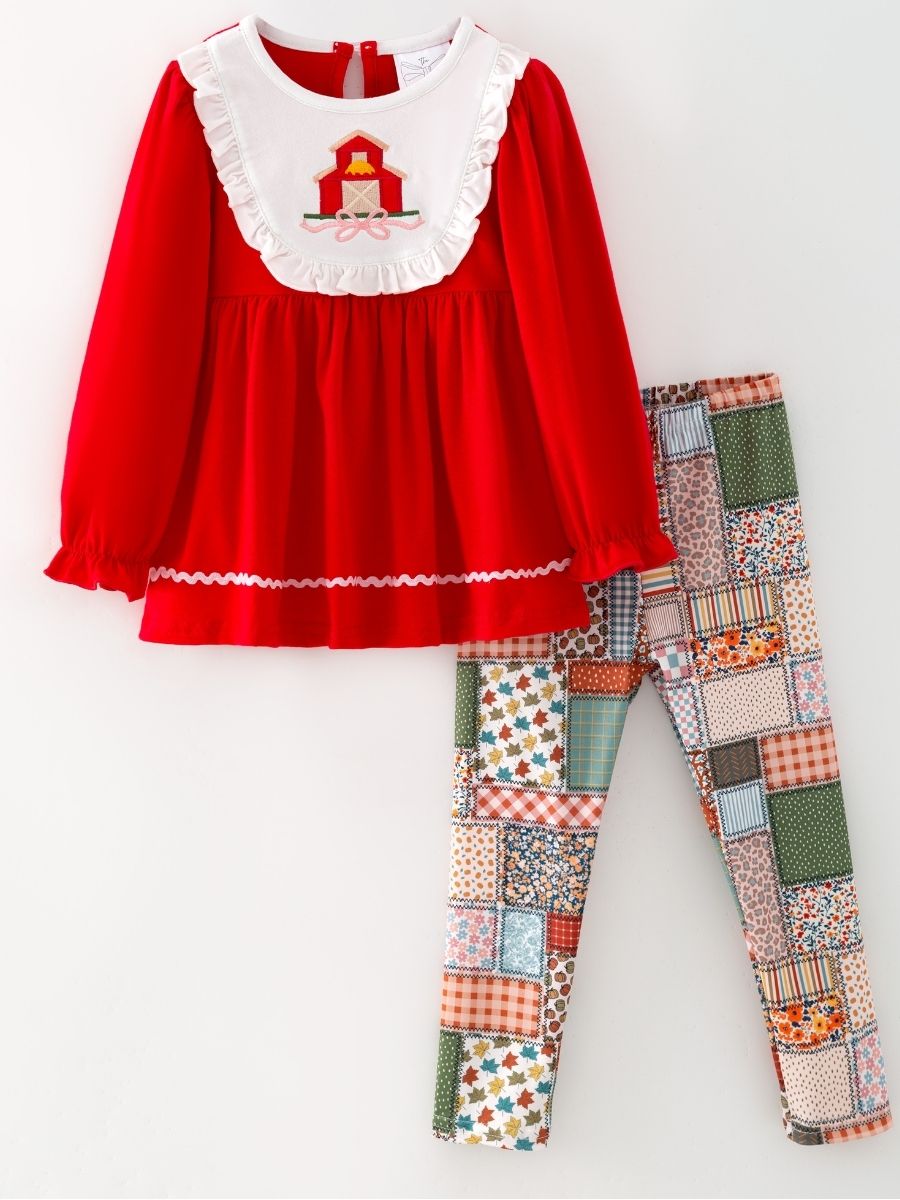 girls fall two-piece with red barn appliqué ruffle bib top and patchwork print leggings