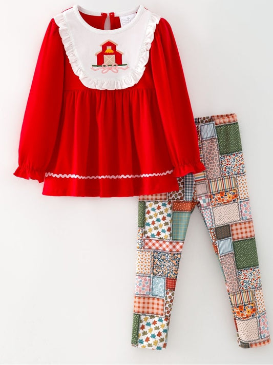 girls fall two-piece with red barn appliqué ruffle bib top and patchwork print leggings