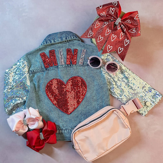 Mini jean jacket with heart patches and sequin sleeves