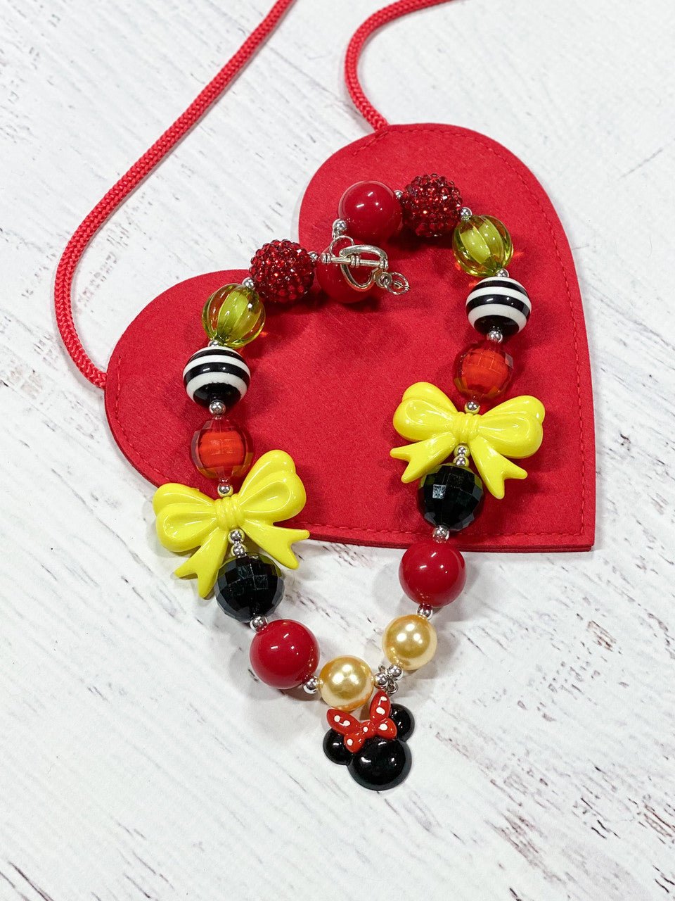Minnie Mouse pendant necklace with red, black and yellow beads
