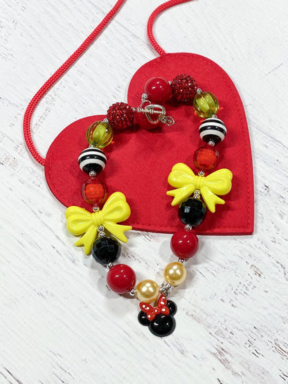 Minnie Mouse pendant necklace with red, black and yellow beads