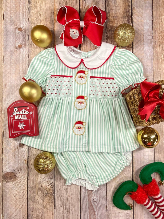 Mint striped infant romper with embroidered Santa faces, smocked chest, and Peter Pan collar – perfect Christmas outfit for baby girls.