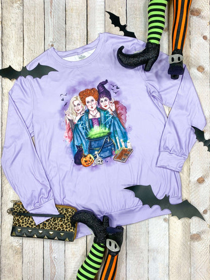 Purple Hocus Pocus sweatshirt laid flat