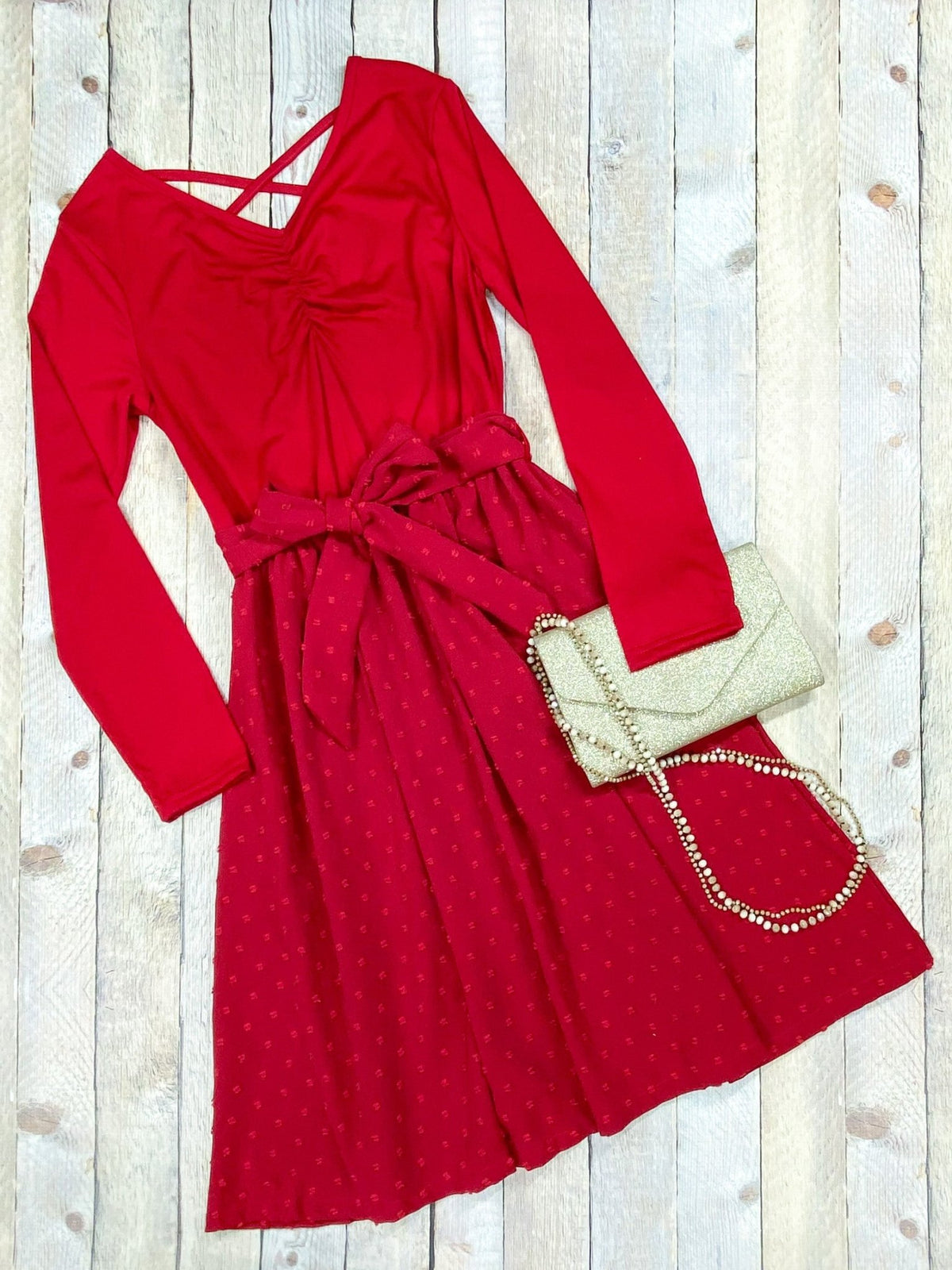 Red long sleeve twirl dress with a full skirt
