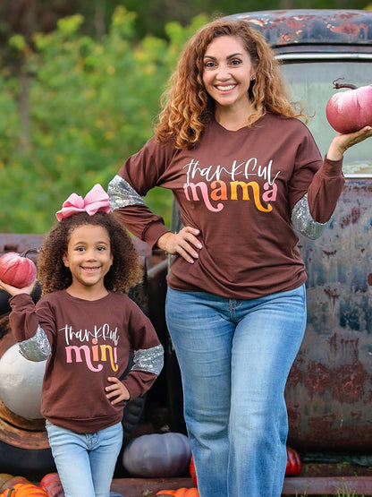 Mom and daughter in brown Thankful sequin sleeve tops
