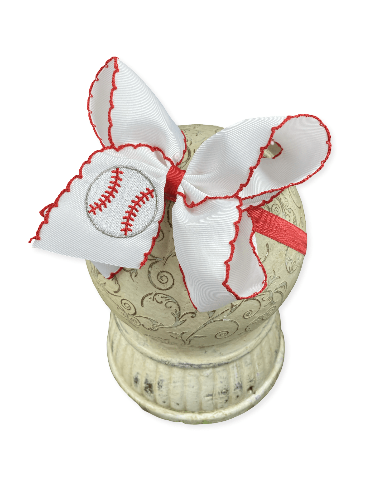 red and white baseball embroidered headband on a white background