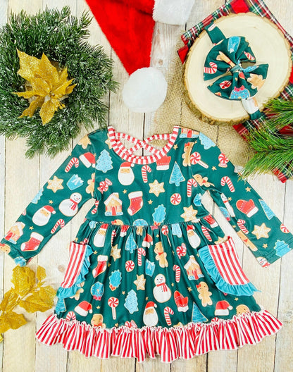 Girls’ long sleeve Christmas twirl dress with holiday cookie print, red-and-white striped ruffle hem, front pockets