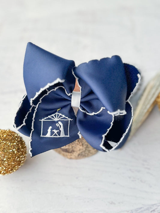 navy with white moonstitch hair bow with nativity embroidered