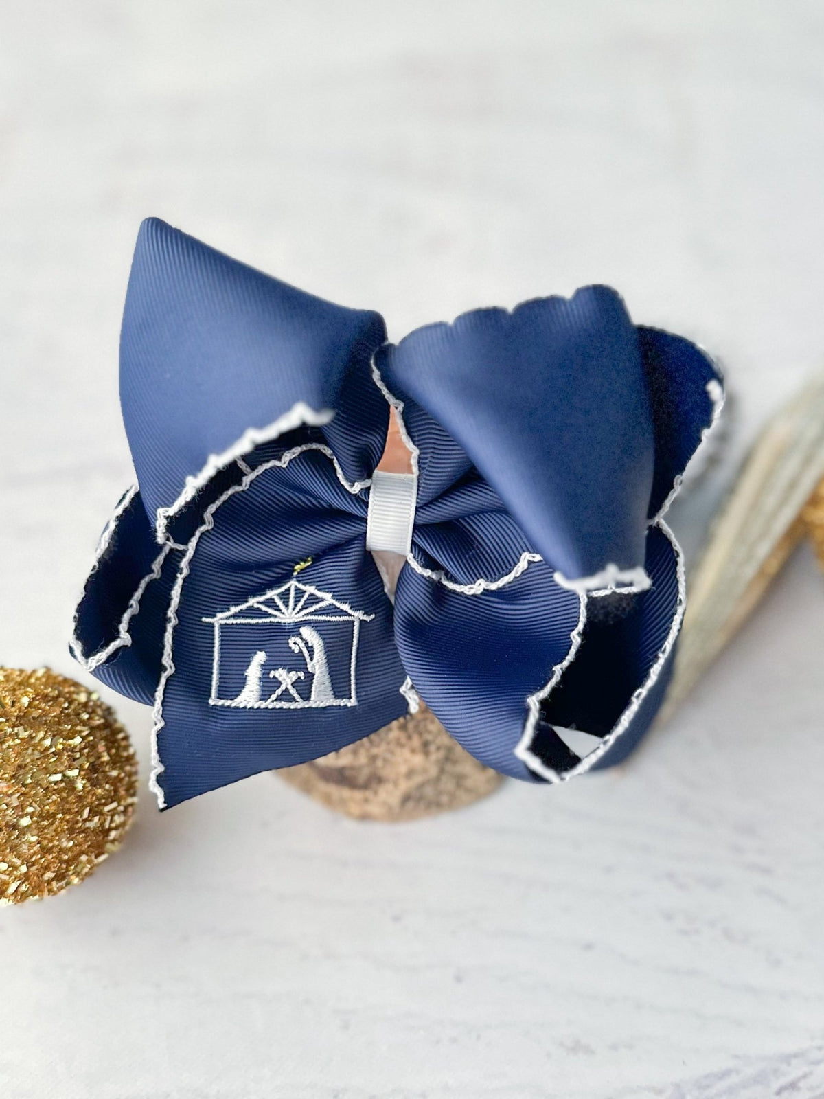 Navy nativity scene embroidered moonstitch hair bow on alligator clip