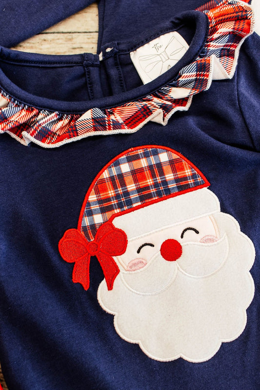 close up of the santa applique showing the red navy and white plaid hat on santa and the plaid ruffle collar - Alternative view