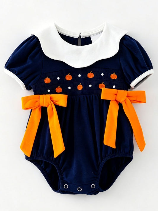 Girls navy smocked pumpkin infant romper with white collar and orange bows